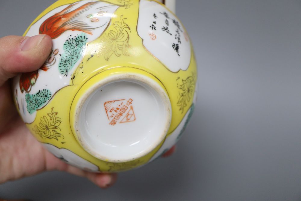A Chinese yellow ground bowl, a figure, spoon rests etc.